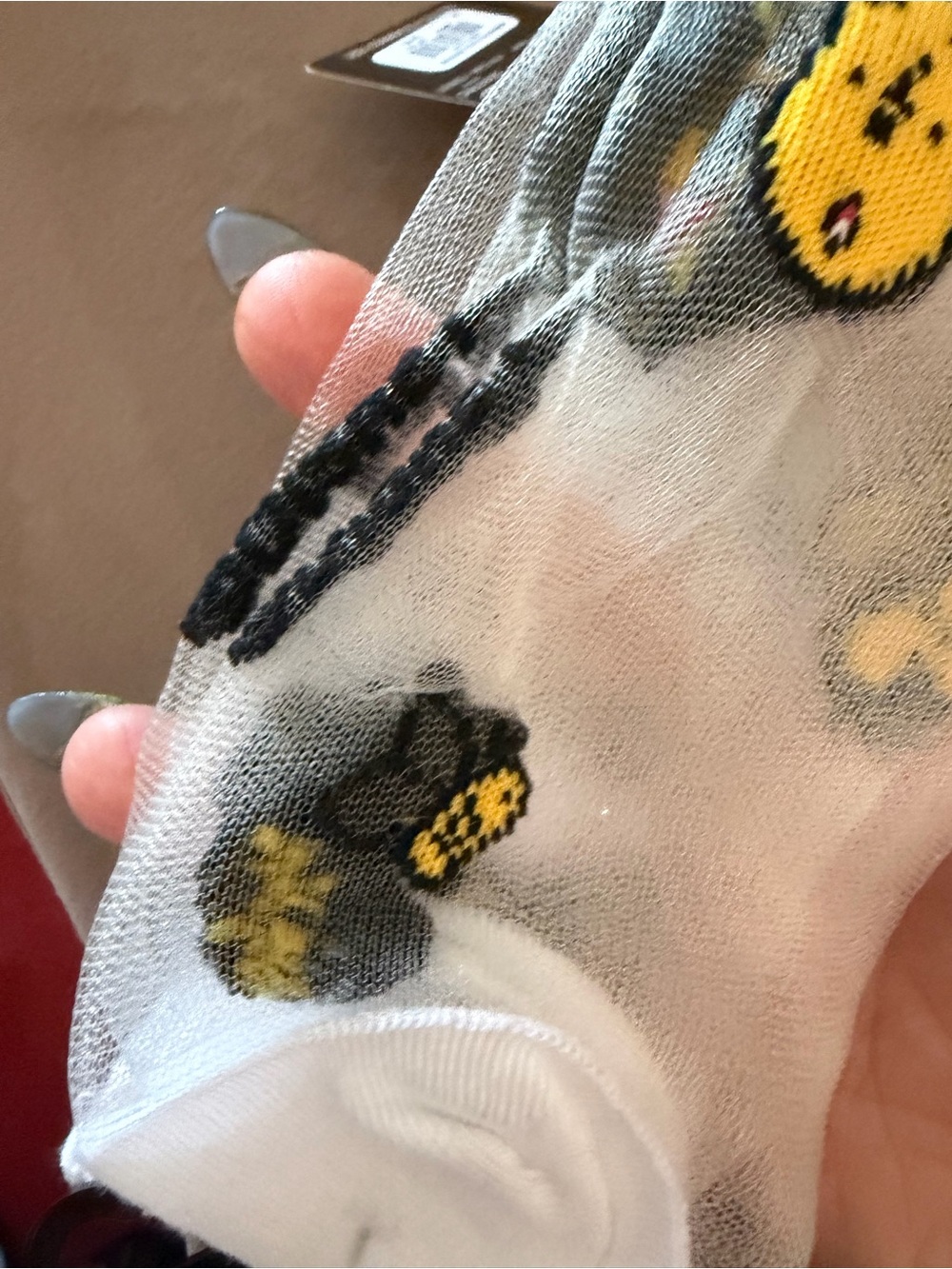 Disney White Sheer Socks with Yellow & Black Winnie the Pooh Accents - Picture 4 of 9